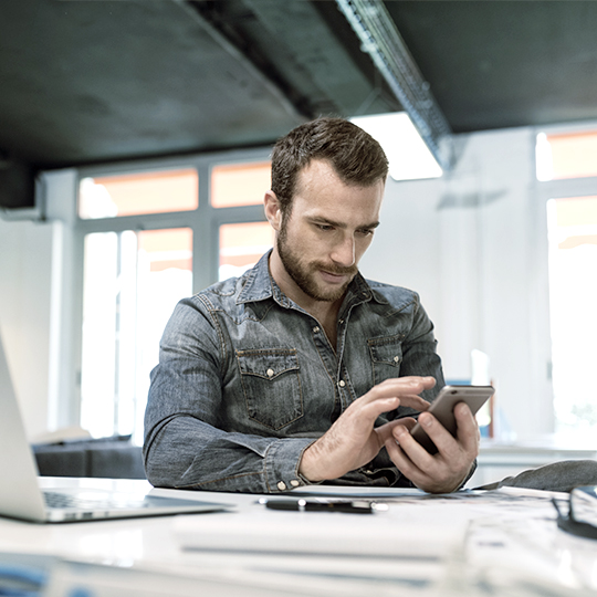 man working with a phone