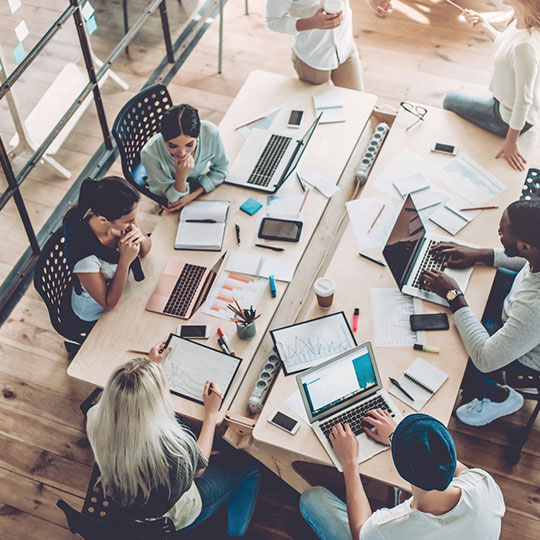 small group of colleagues having a discussion