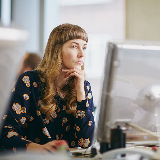 woman looking to the screen