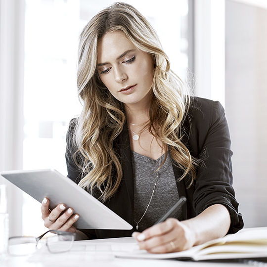 woman looking into some papers